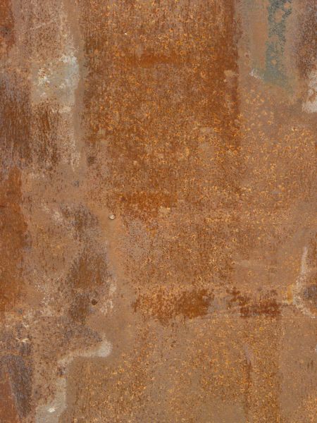 Red rust texture with various light patches and small rust specks throughout.
